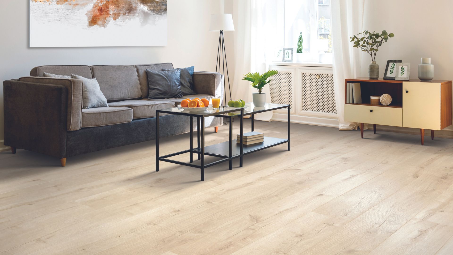 light toned wood look laminate floors in a bright living room